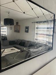 Svart  spegel rektangulär med dekorativ ram