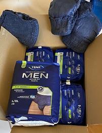 En kartong med vuxenblöjor, herr, storlek L/XL skänkes