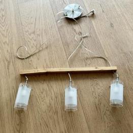 Taklampa på träribba